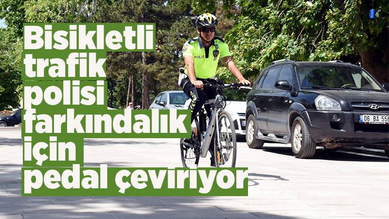 Bisikletli trafik polisi farkındalık için pedal çeviriyor