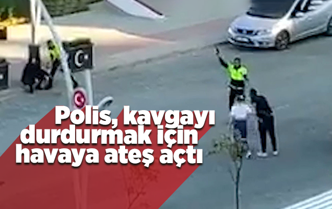 Polis kavgayı durdurmak için havaya ateş açtı, o anlar kamerada